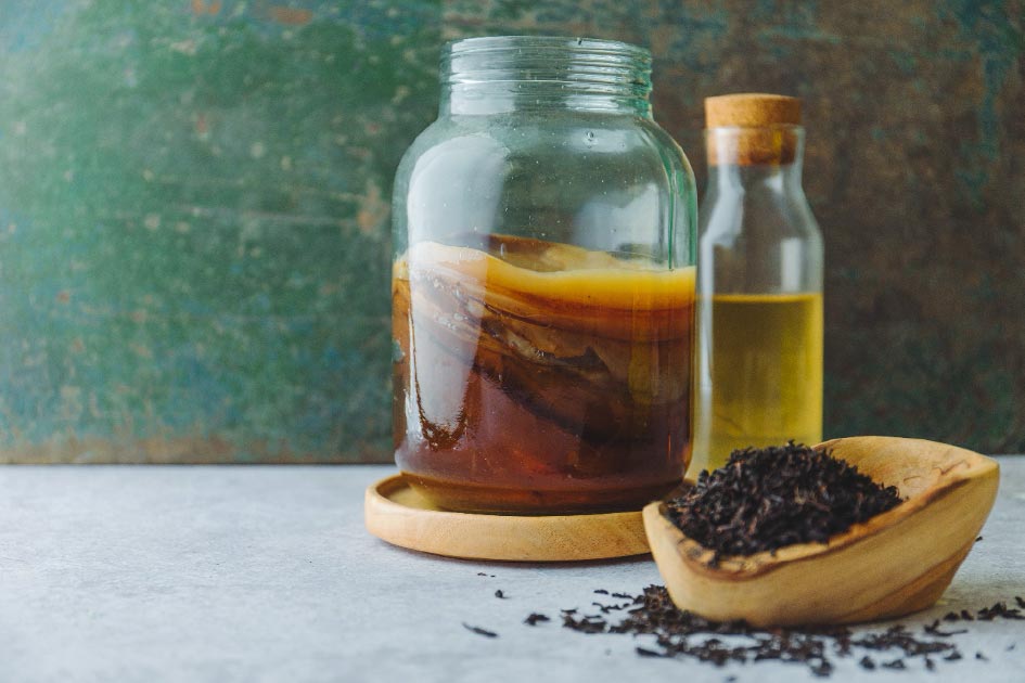 A SCOBY in a jar. (AdobeStock)