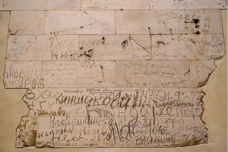 Featured Image: Deliberately preserved graffiti within the German Reichstag in Berlin. Source: Ole Neitzel / CC BY-SA 4.0 